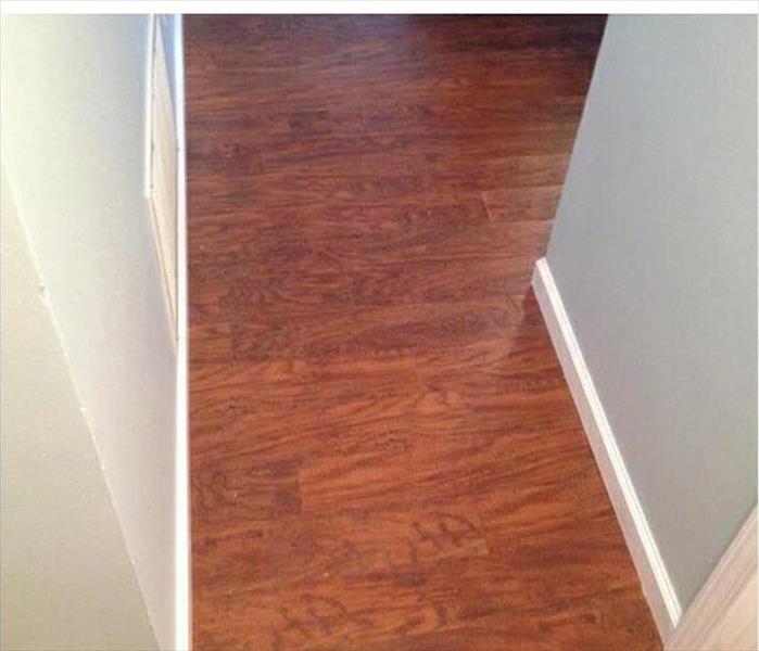 replaced flooring, dry and neat hallway